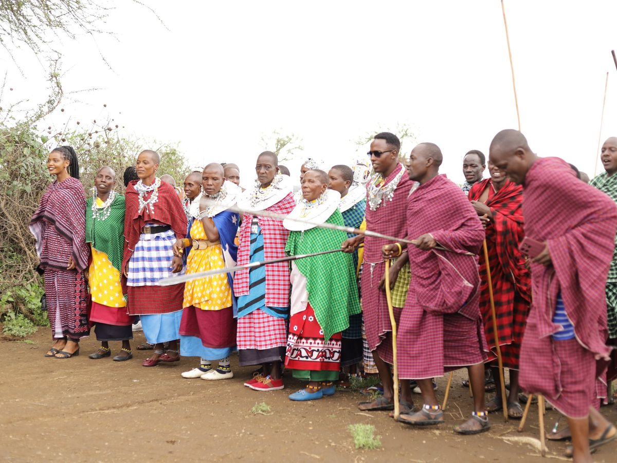 Maasai men and women in traditional dress